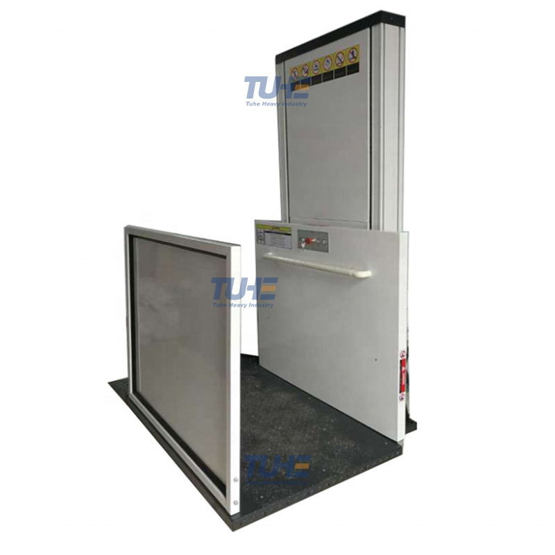 Vertical wheelchair lift